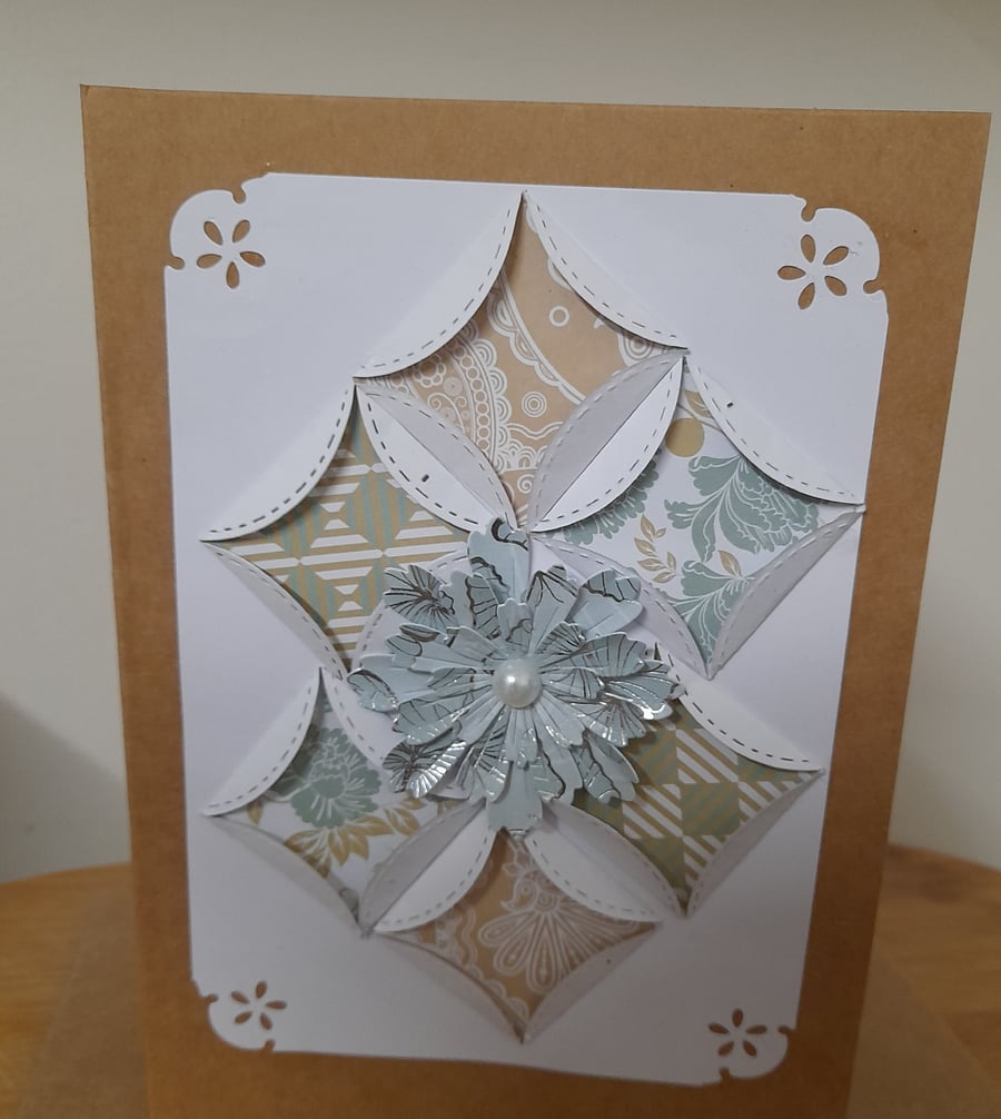 HANDMADE ORIGAMI PATTERNED CARD.