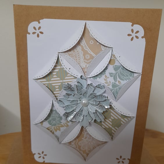 HANDMADE ORIGAMI PATTERNED CARD.
