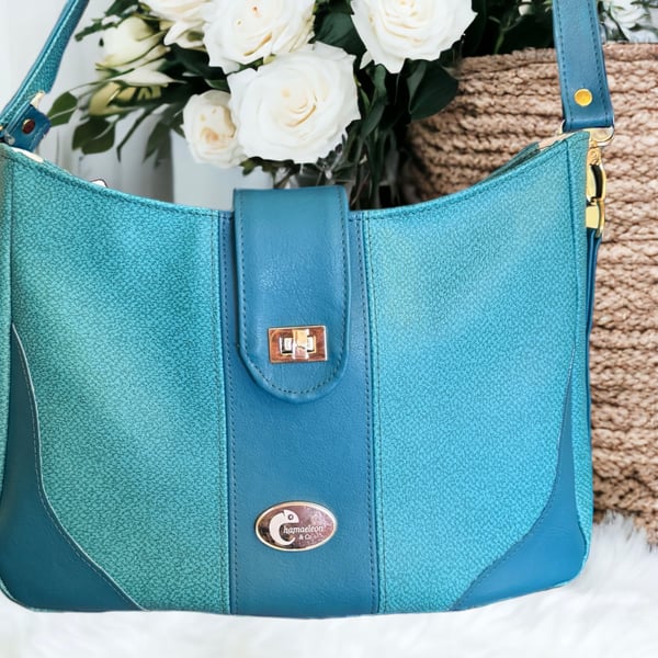 Shoulder bag in two tone teal faux leather 