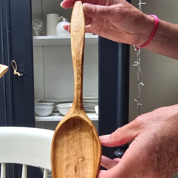 Hand-carved cherry wood kitchen spatula