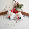Pair of tiny christmas lavender bags made in a vintage Christmas tablecloth