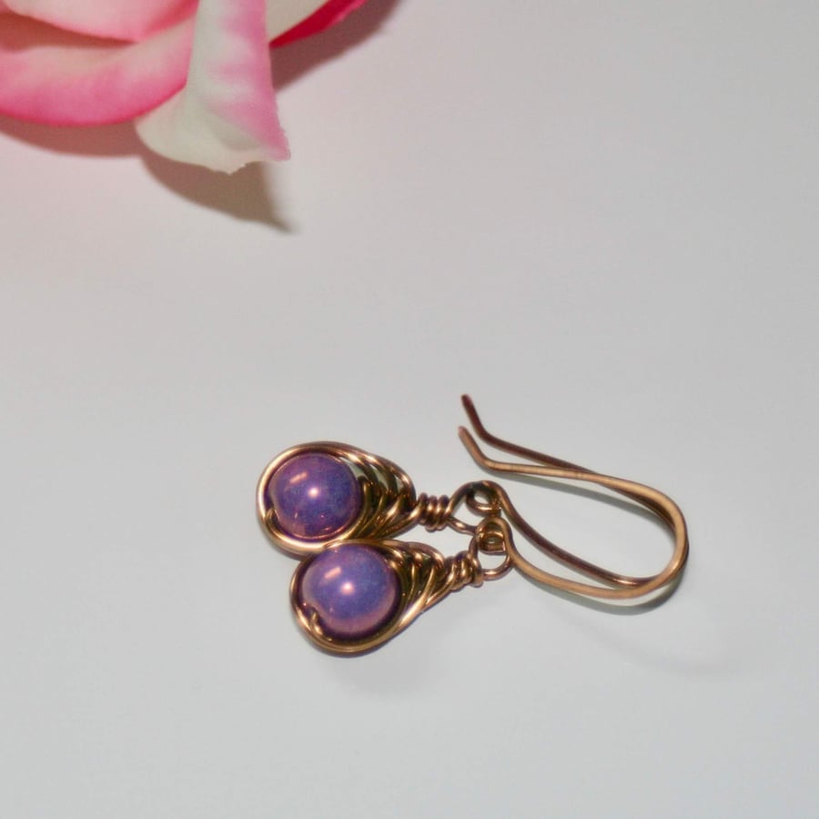 Wire-wrapped purple glass pearl earrings