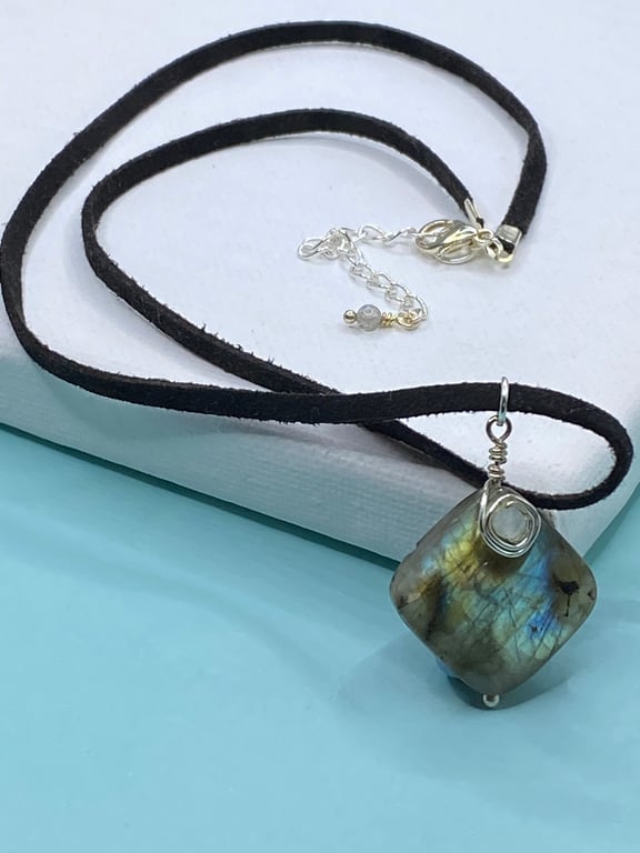 Square labradorite stone pendant on black faux suede cord