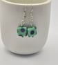 Czech Glass Green cubed earrings with a peacock pattern - Image 1
