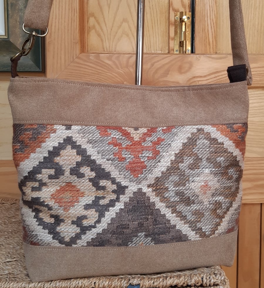 Brown tapestry crossbody bag