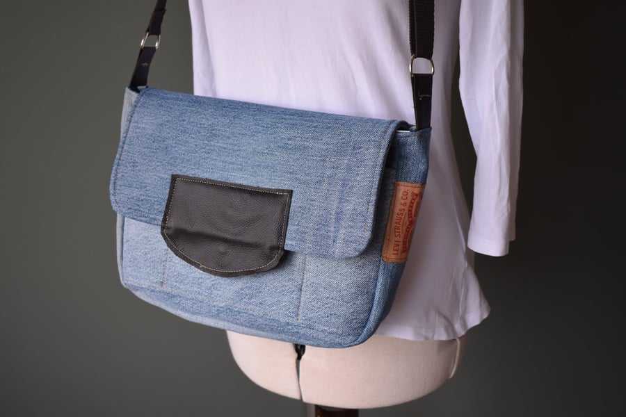 Satchel style preloved denim handbag cut from Levi denim jeans.