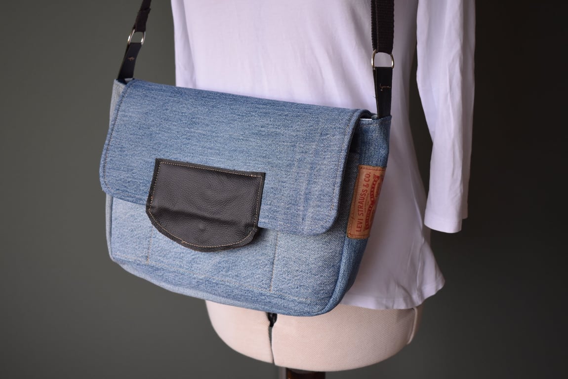 Satchel style preloved denim handbag cut from Levi denim jeans.