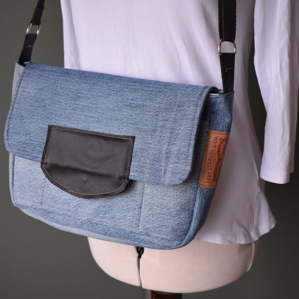 Satchel style preloved denim handbag cut from Levi denim jeans.