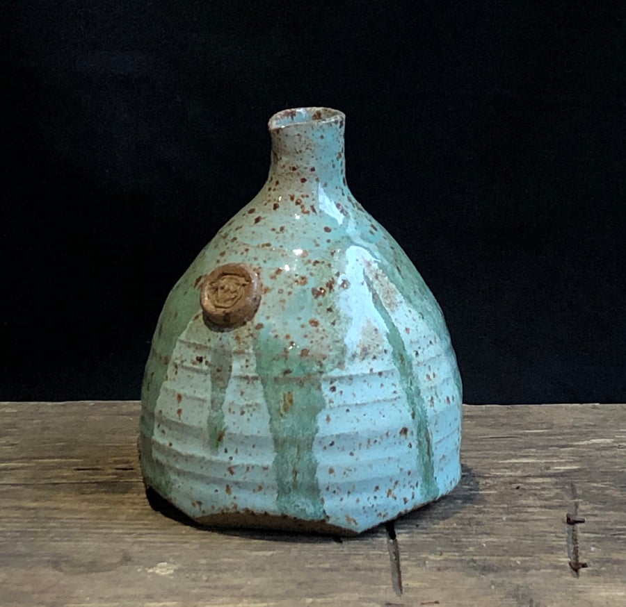 Drippy glazed bud vase with small spout