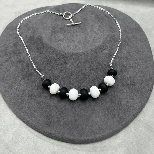black and white lampwork glass necklace seaglass style