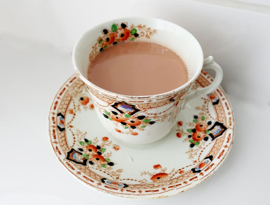 Fake Display Cup of Tea in vintage china cup with saucer