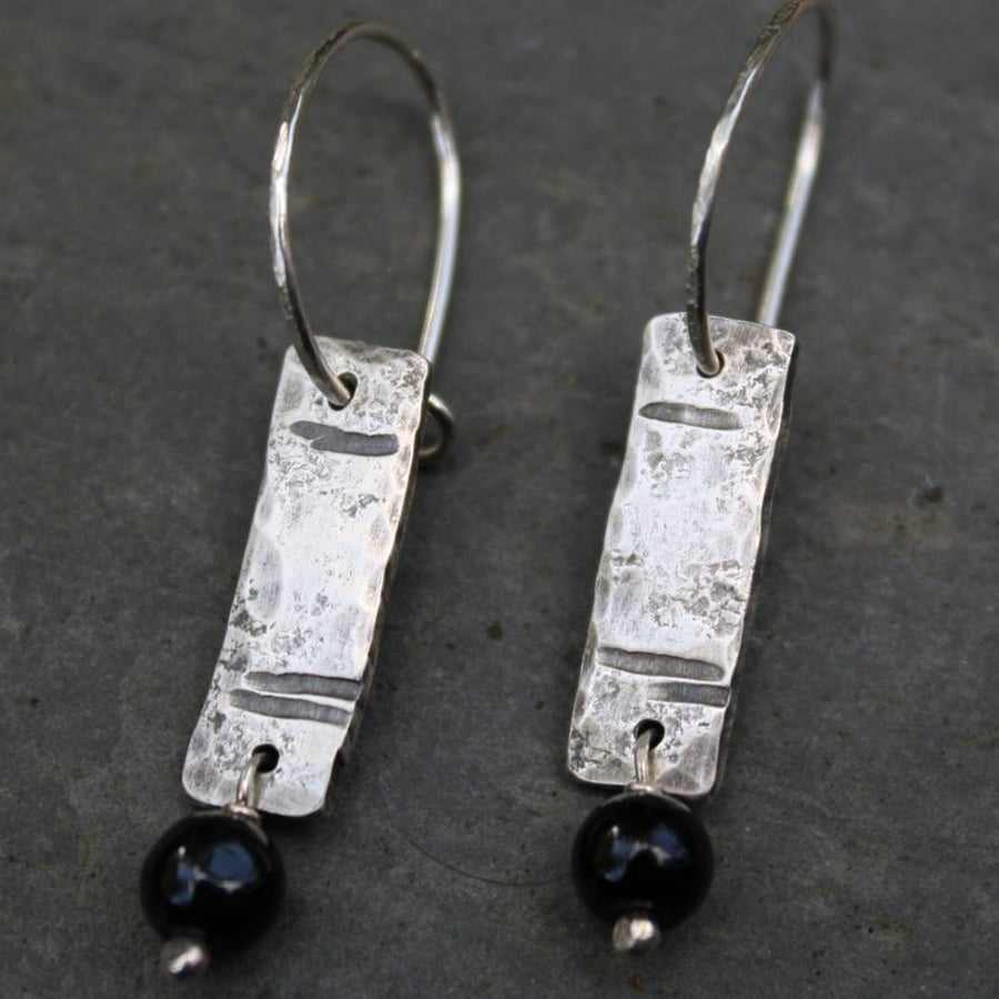 Notched silver and onyx earrings, oxidised