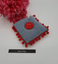 Pin cushion in denim with red bobble trim.  - Image 3