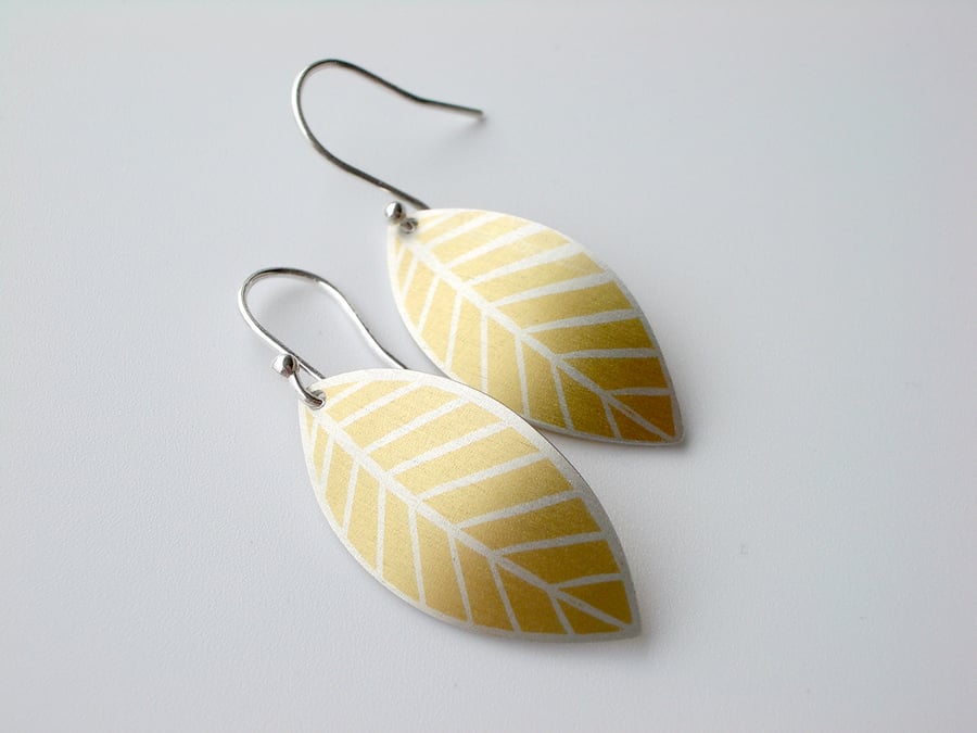 Yellow leaf oval earrings