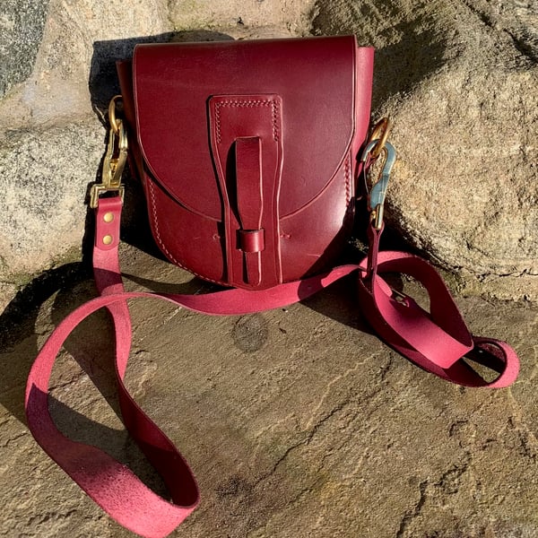 Red leather bag with shoulder strap