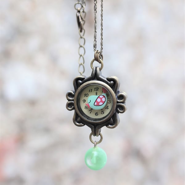 Upcycled ladies watch case decorated with birdy charm handmade necklace 