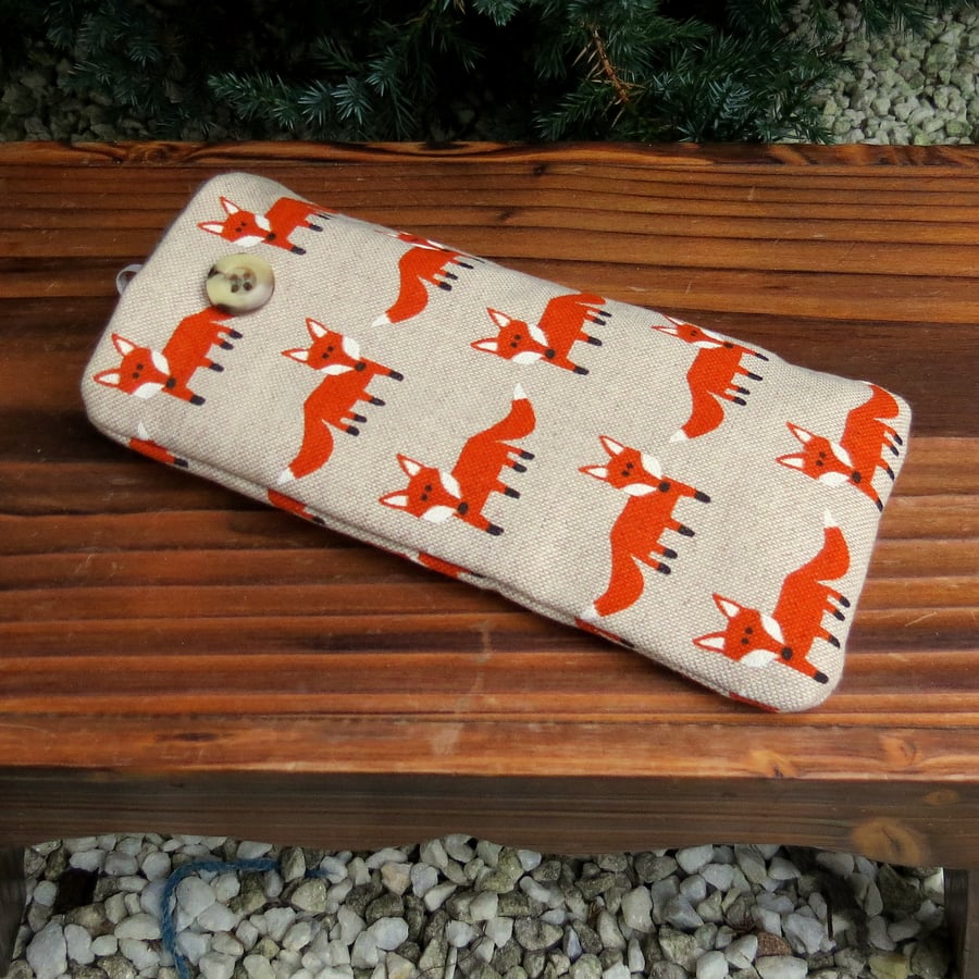Foxes.  A padded glasses sleeve.  Glasses case.