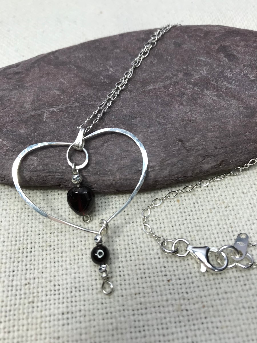 A Garnet & Sterling Silver handcrafted necklace