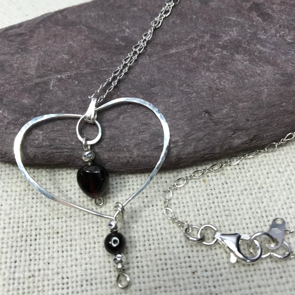 A Garnet & Sterling Silver handcrafted necklace