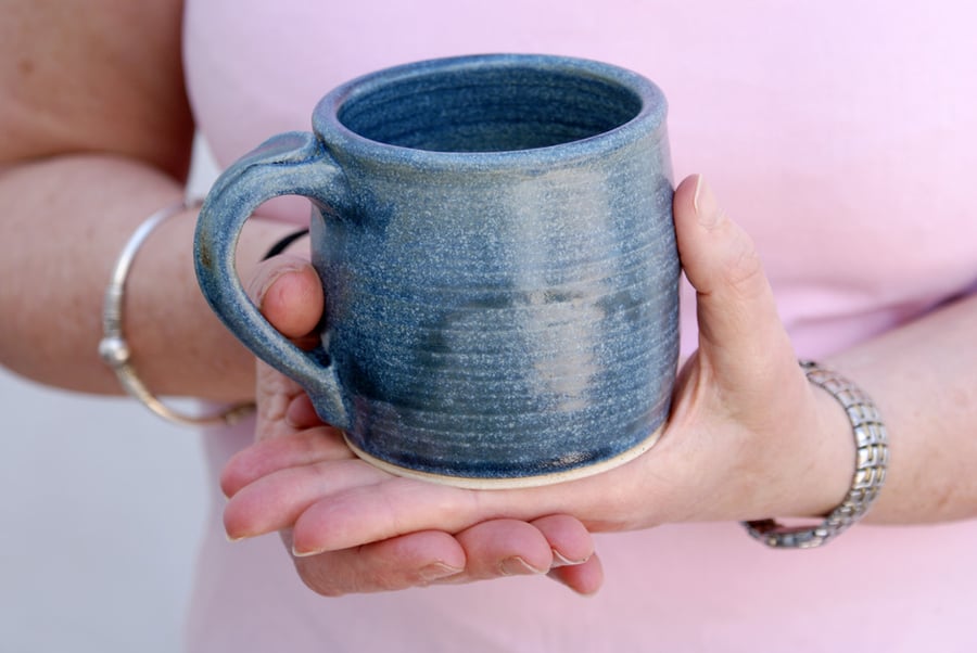 Two tankard style stoneware pottery mugs - glazed in smokey blue