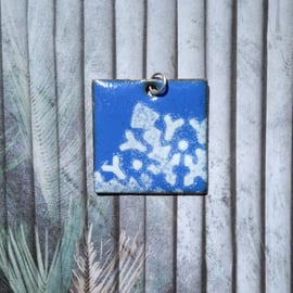 Lacy enamelled copper pendant in blue and white 196