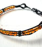 Caged Amber - black and orange bracelet - Image 3