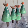 A single small ceramic Christmas tree dangly decoration, mini robin, gold detail