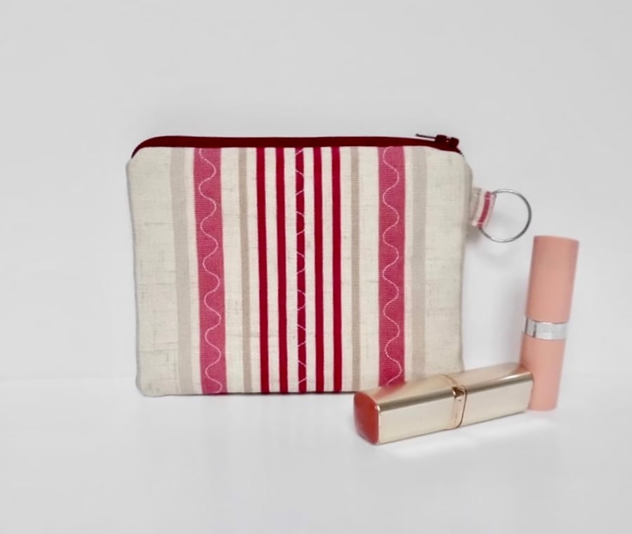 Small makeup bag or large coin purse in pink striped fabric