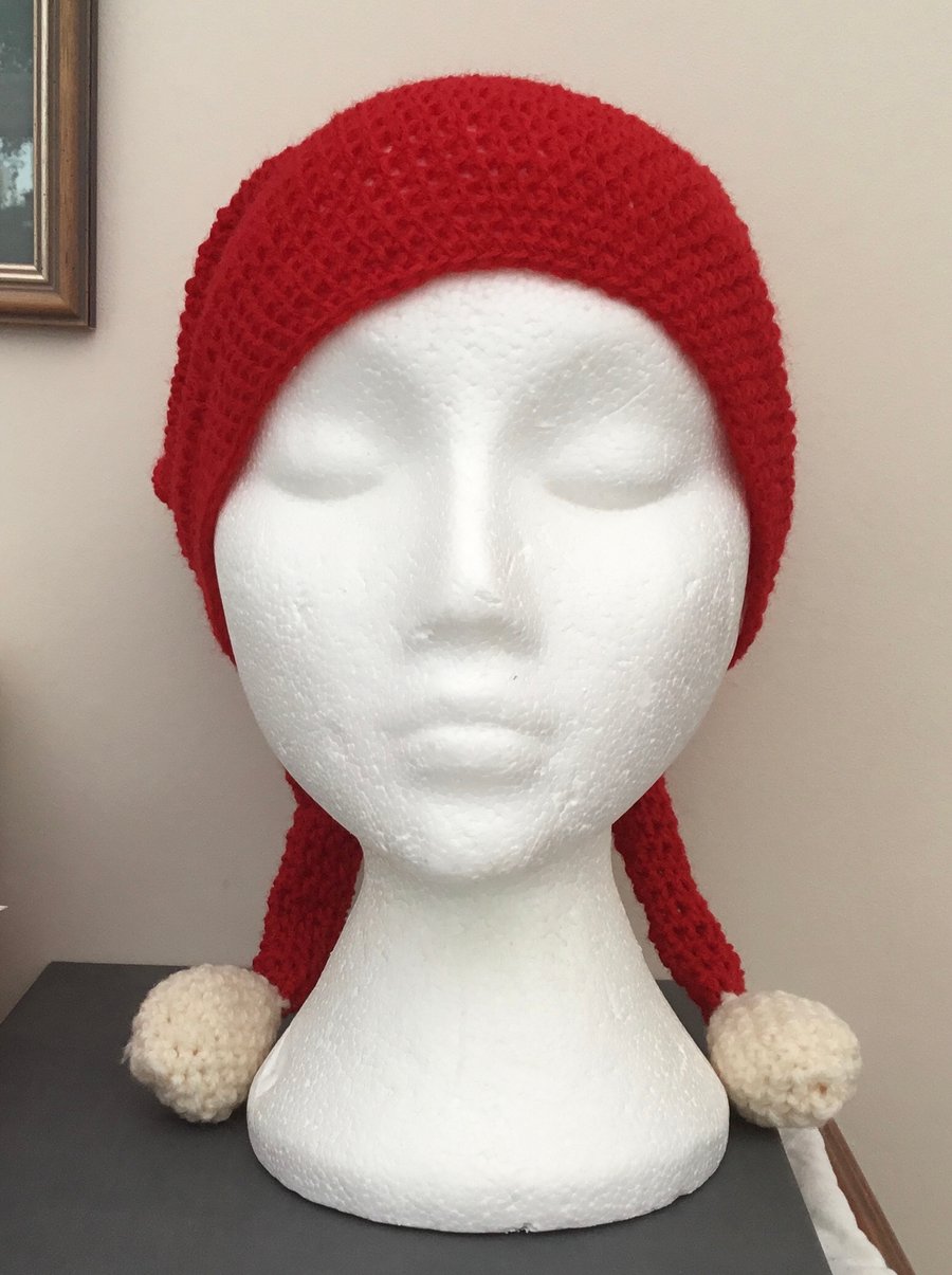 Fun Santa Hat with a Twist! Crocheted Santa Hat with Two Tails and Bobbles.