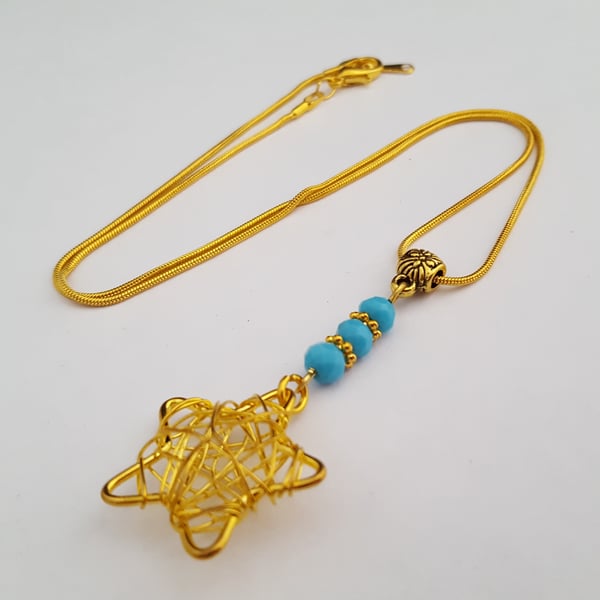 Turquoise and gold star necklace 