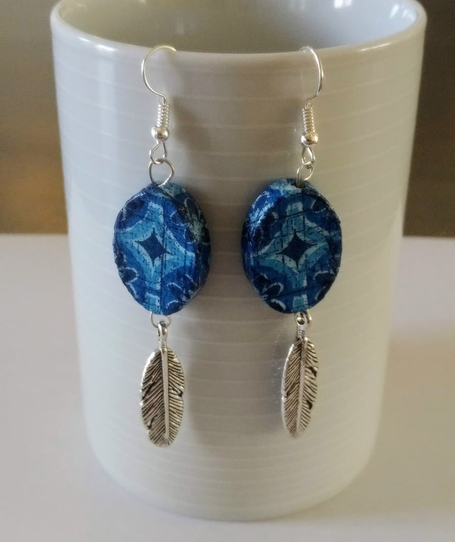 Oval decoupaged wood earrings with leaf charm