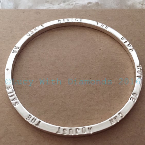 Sterling silver bangle "we can't direct the wind but we can adjust the sails"