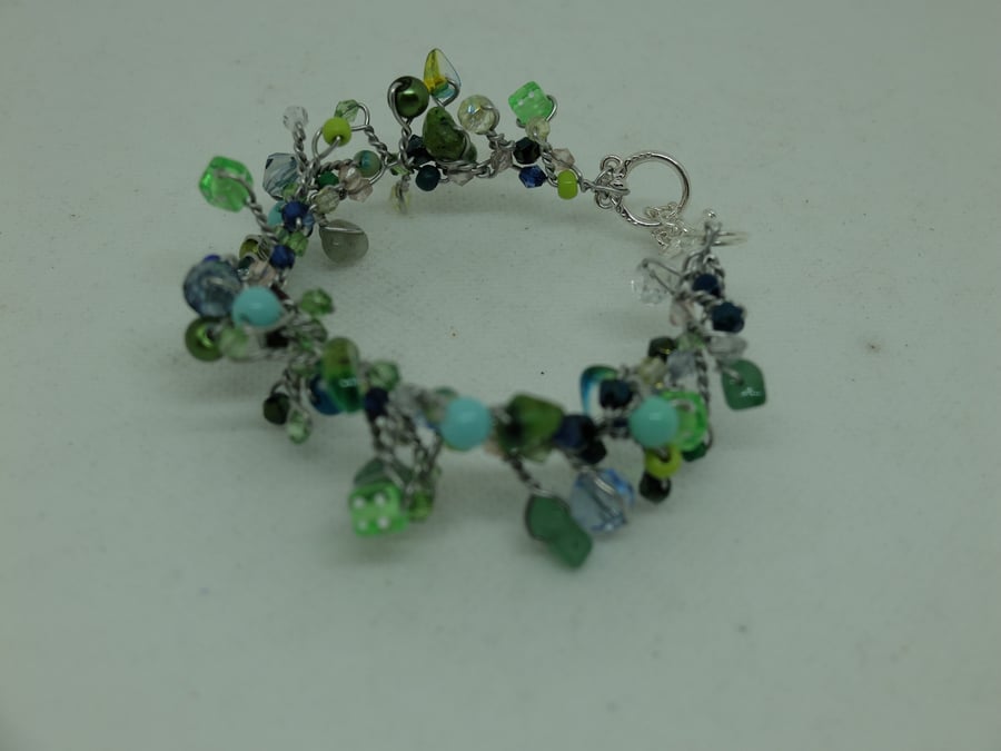 Turquoise and green beaded bracelet with dice beads