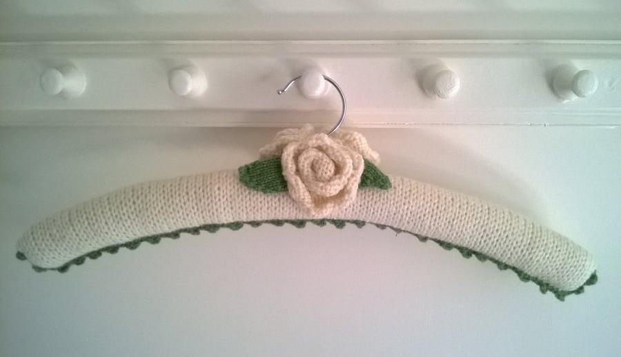 Classic cream rose hand knitted ladies coat hanger 