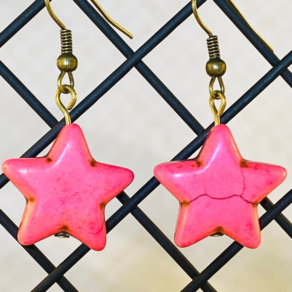 Pink star earrings