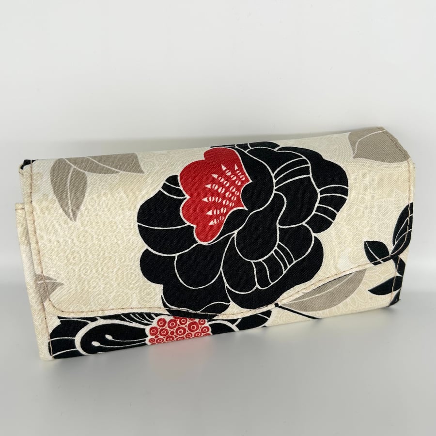 Black and cream large purse, black and red flowers, many sections and pockets