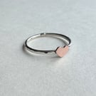 Hammered silver ring with copper heart