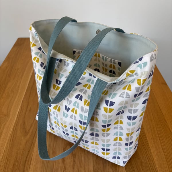 Colourful cotton tote bag, shopping bag, in a stylish geometric print