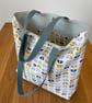 Colourful cotton tote bag, shopping bag, in a stylish geometric print