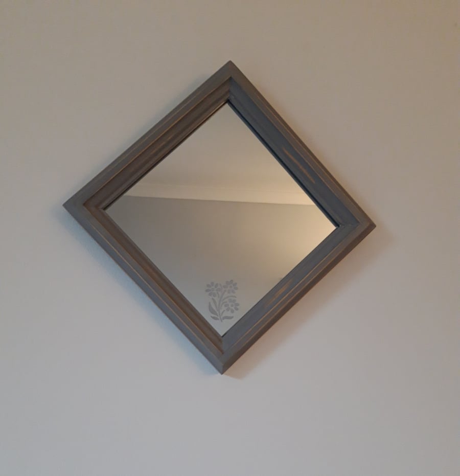 Engraved wall mirror