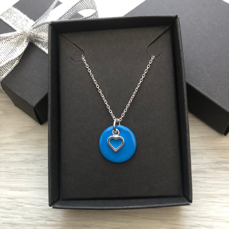 Blue enamel disc and sterling silver heart. Sterling silver necklace.