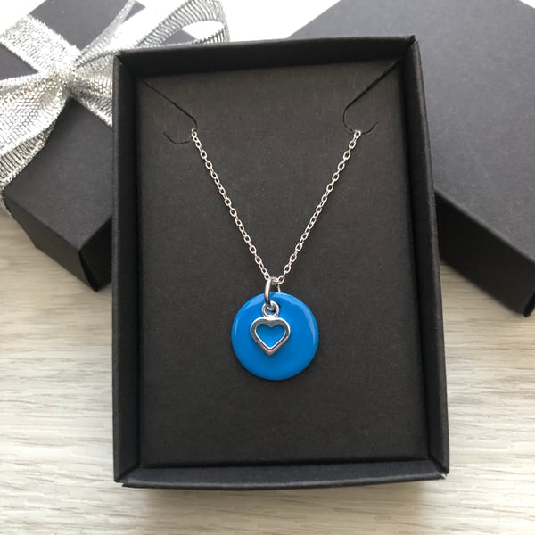 Blue enamel disc and sterling silver heart. Sterling silver necklace.