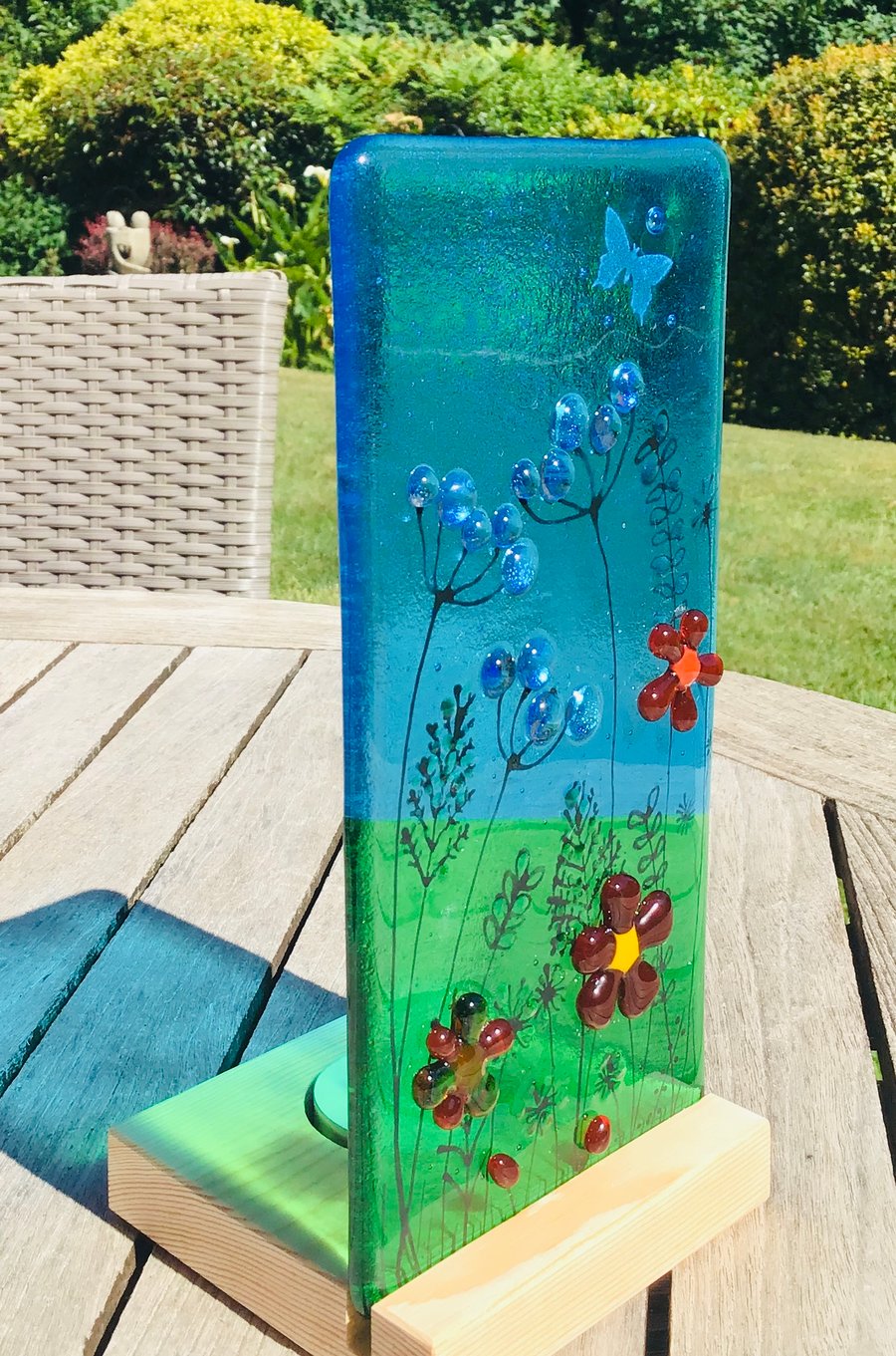 Fused glass panel in a wood base 