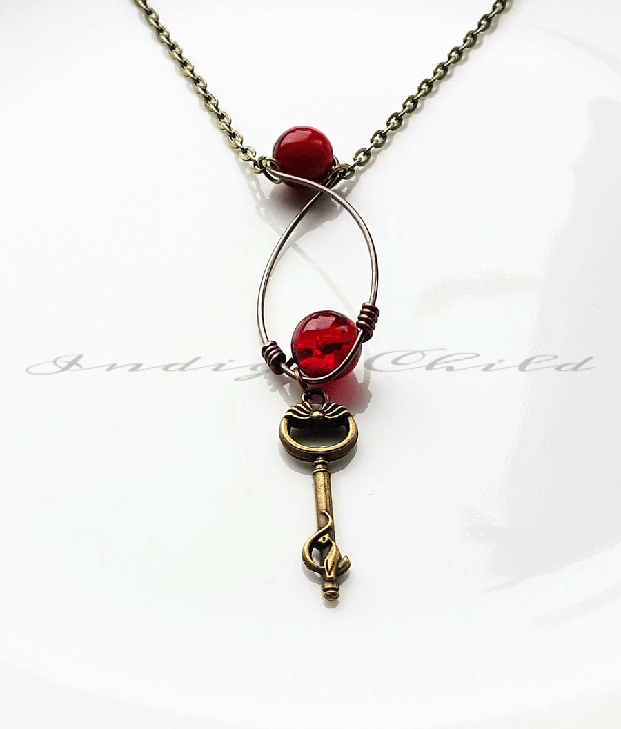 Necklace Bronze Memory Wire Key Pendant And Chain With Red Glass Crackle Beads.