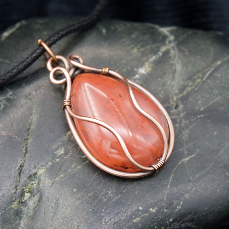 Copper Wire Wrapped Pendant with Translucent Red Coral Coloured Stone