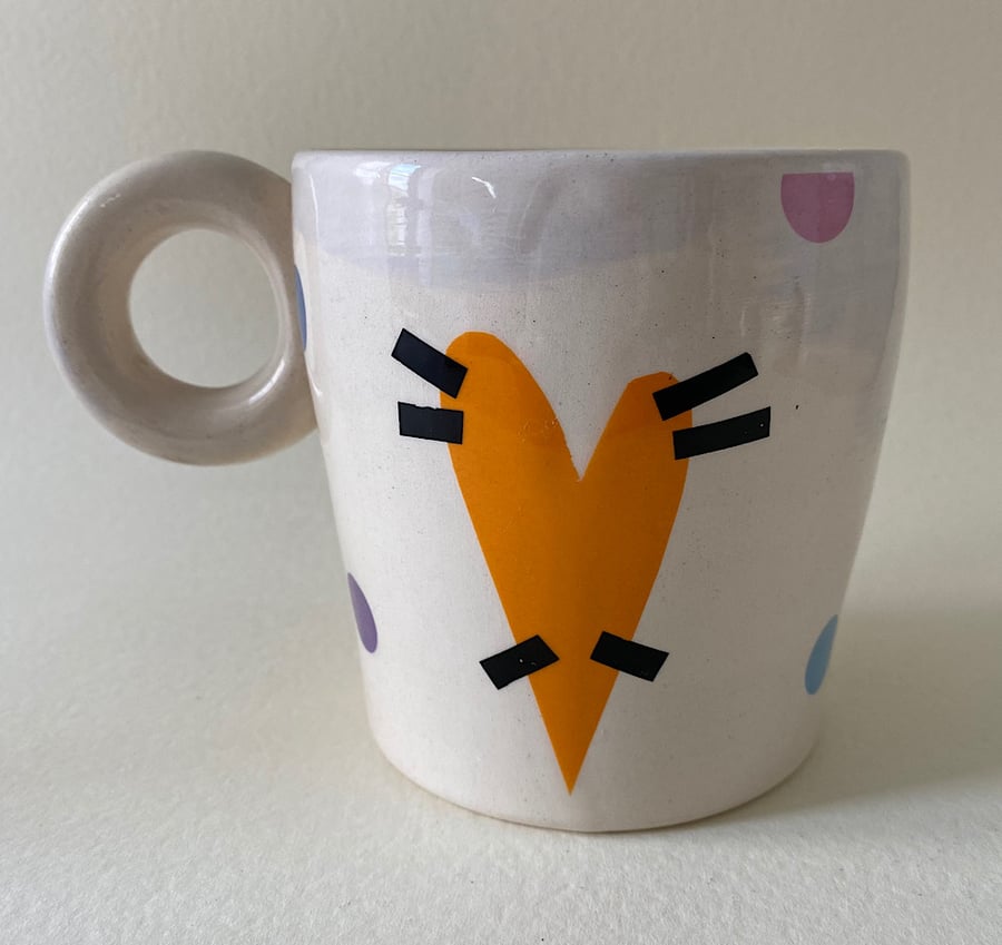 Orange love heart handmade ceramic mug.