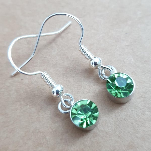 peridot green coloured glass earrings silver plate set on silver plate earrings