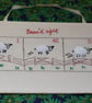Counting sheep hand embroidered picture.