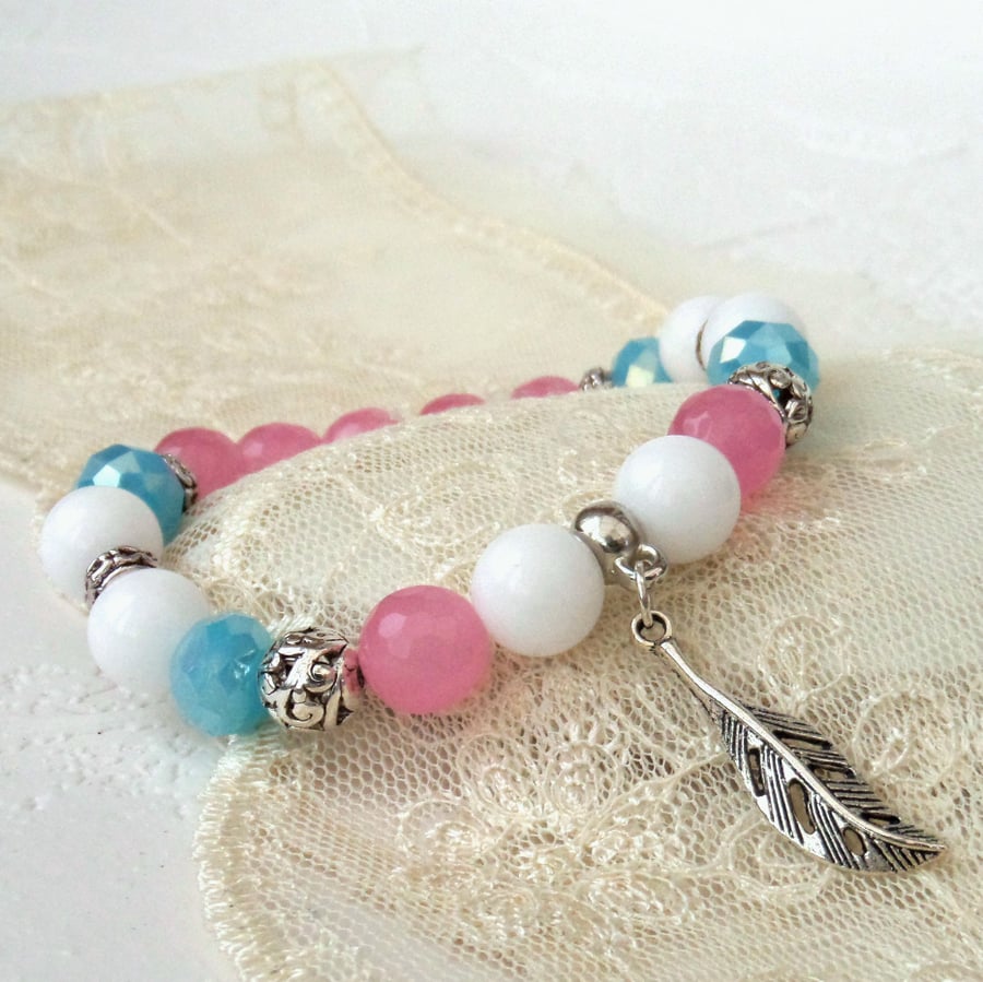 Handmade bracelet with feather charm, pink, blue and white stretchy bracelet