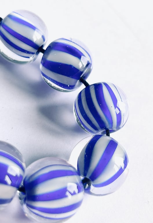 Handmade blue and white striped lamp work glass beads